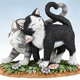 cat sculptures,
Their Tails Tell The Tale